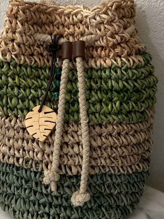 Gorgeous drawstring back pack,artisan style,raffia material,wood leaf charm NWOT main image 5